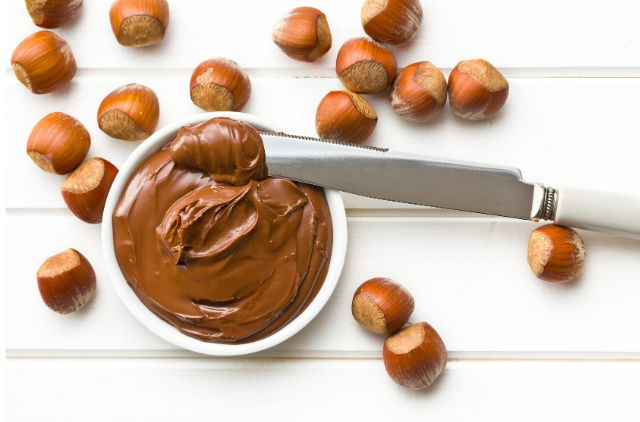 A bowl of nutella on a white surface (Is Nutella Good For Weight Loss?)