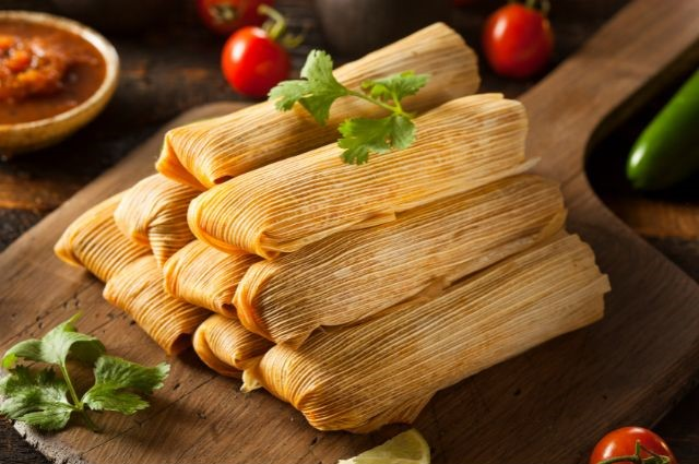 Tamales on wooden cutting board. (Are Tamales Good for Weight Loss?)