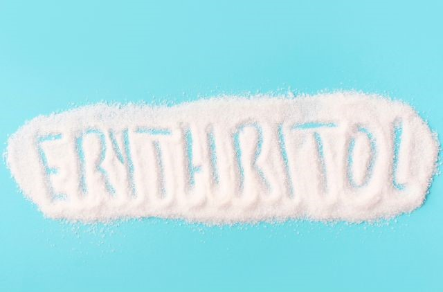 the text erythritol written with a white powder