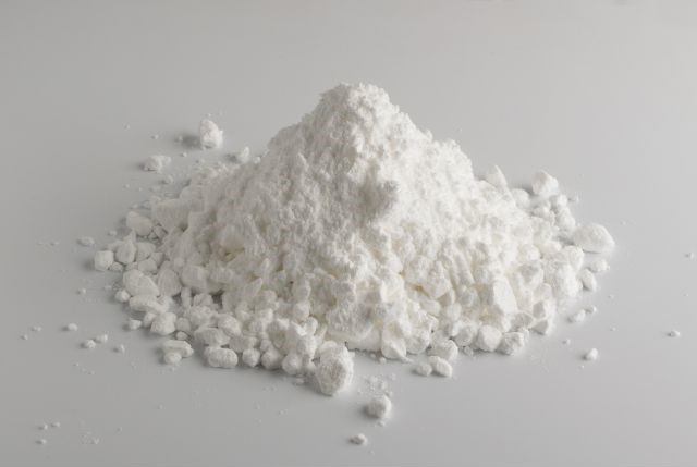refined flour laying on a white surface