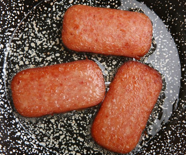 fried spam on a pan