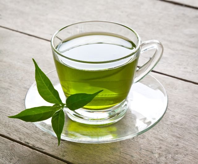 a glass of green tea