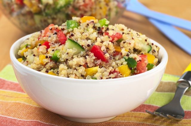 Vegetarian quinoa salad served in a white bowl