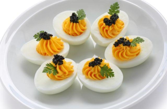 Deviled eggs served on a white plate (Are Deviled Eggs Good for Weight Loss?)