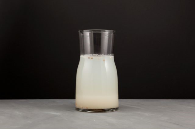 a bottle of milk sitting on top of a table