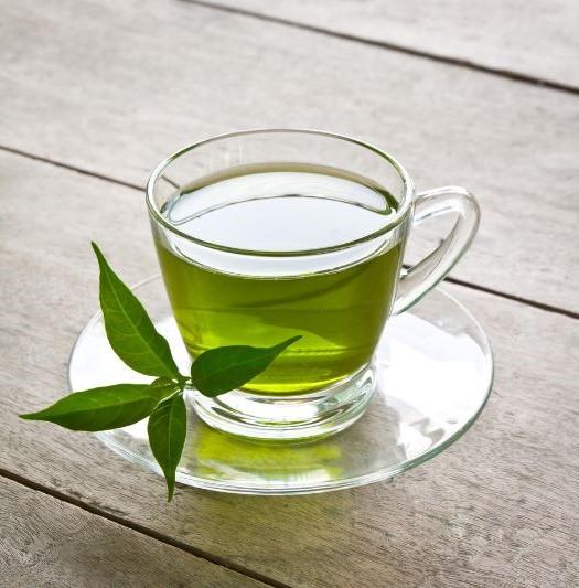 Green tea in a glass cup (Best Time to Drink Green Tea for Weight Loss)