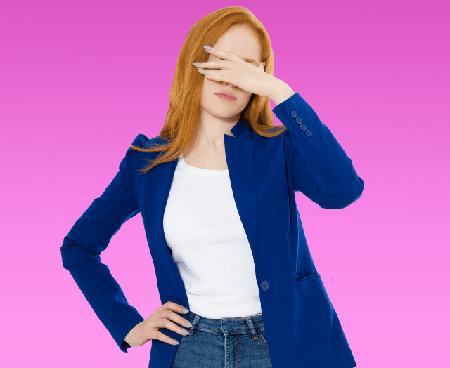 A woman rubbing her eyes, expressing low-energy