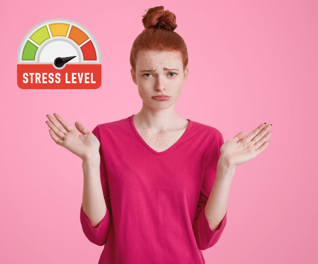 Woman in a pink shirt with a stress level gauge beside her.